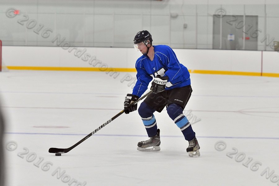 Wheaton College Men\'s Ice Hockey vs Middlesex Community College. - Photo By: KEITH NORDSTROM